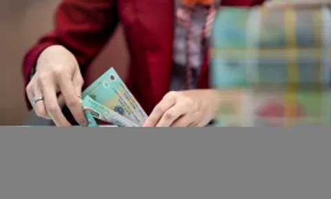 Kho bạc đôn đốc chi trả quà Tết 400.000 đồng/người đúng hạn