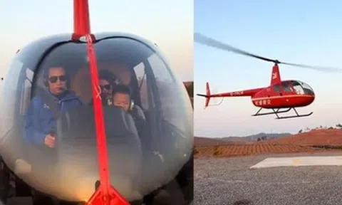 Chồng lái trực thăng đưa vợ con về quê đón Tết, 80km chỉ mất 15 phút