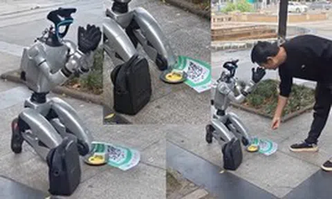 Trung Quốc: Robot quỳ giữa phố xin tiền sạc pin